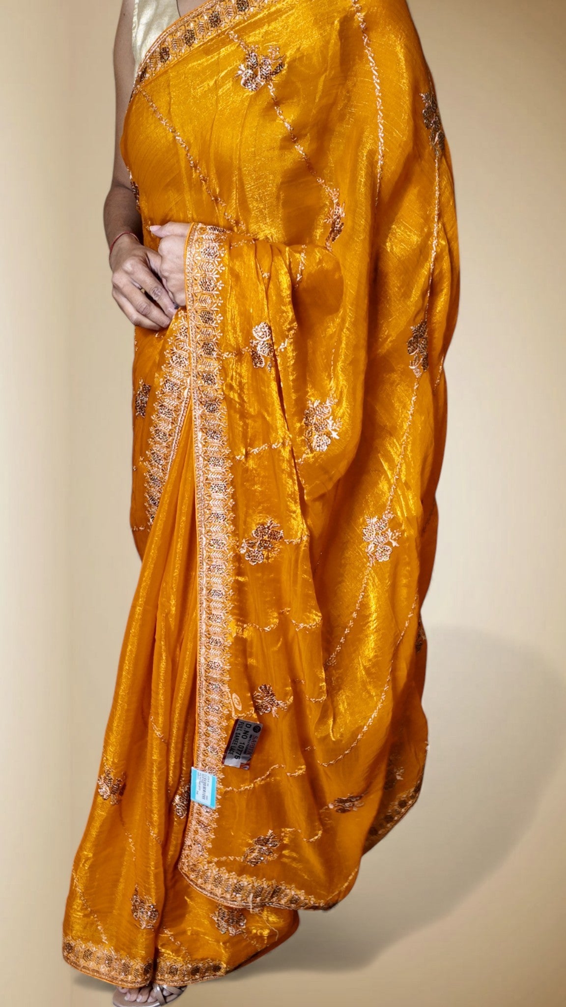 Saffron Radiant Regal Elegance Saree