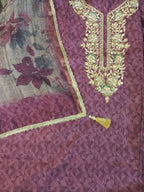 Purple Embroidered Kurta Set Highlighting Its Traditional Design and Vibrant Color