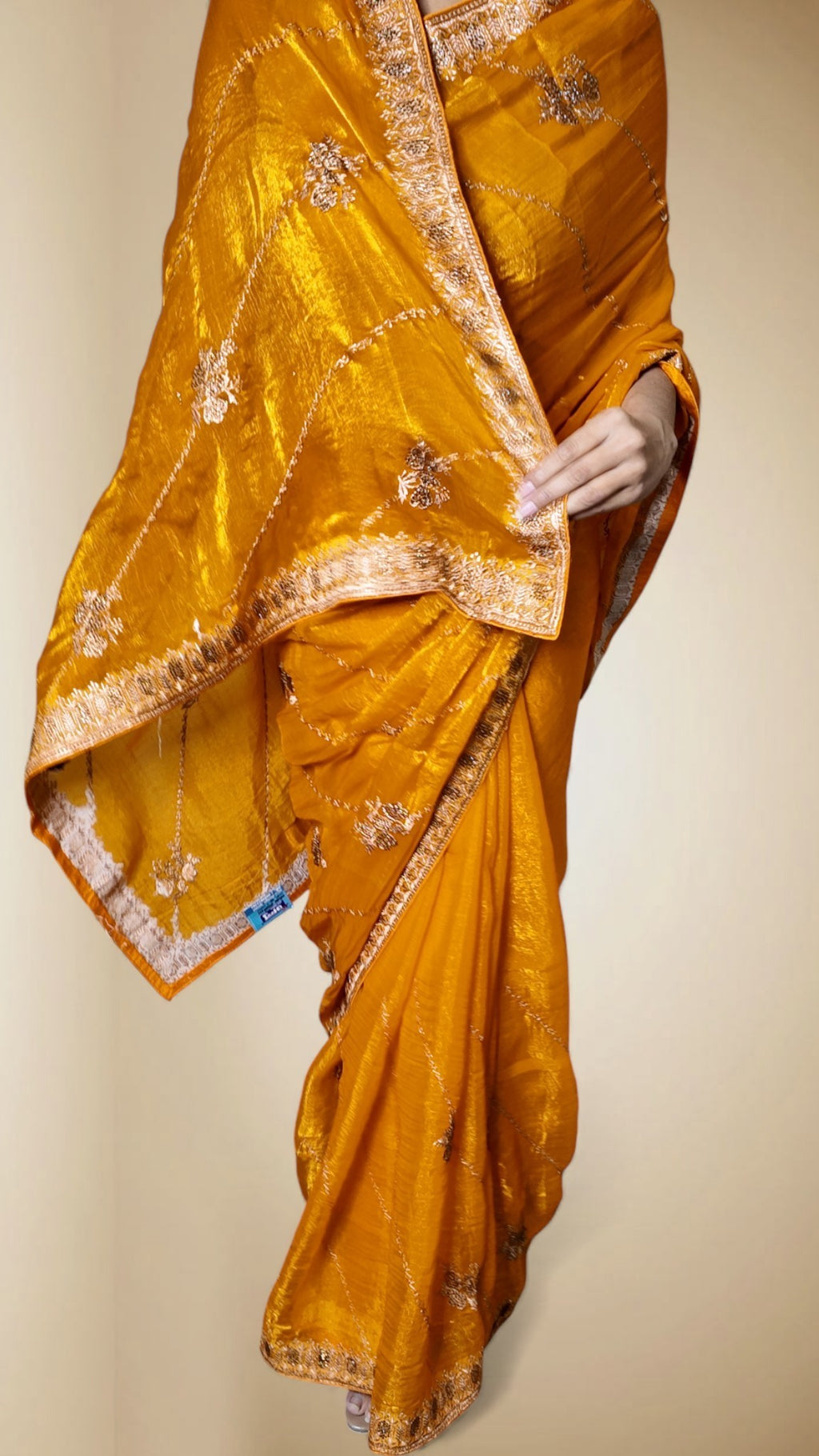 Saffron Radiant Regal Elegance Saree