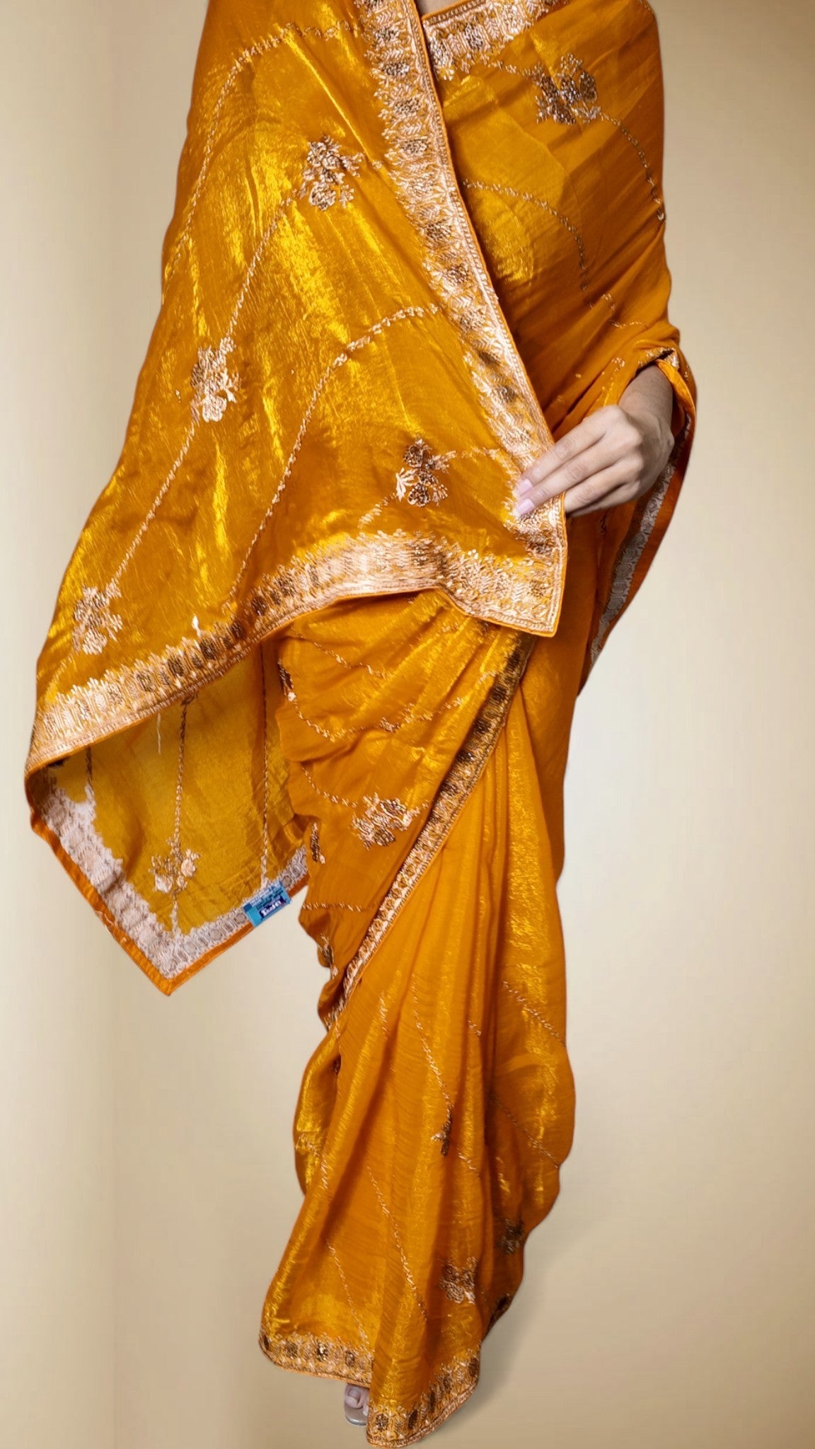 Saffron Radiant Regal Elegance Saree