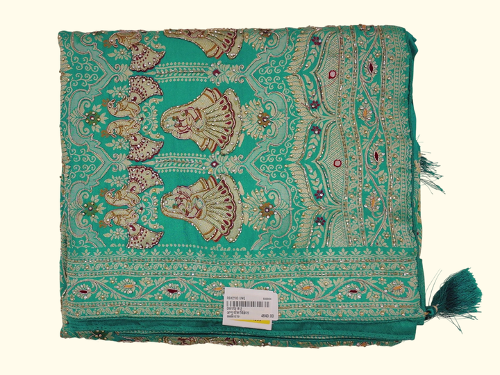 Enchanting Green Saree with Intricate Cultural Patterns", - Image 1_no_bg