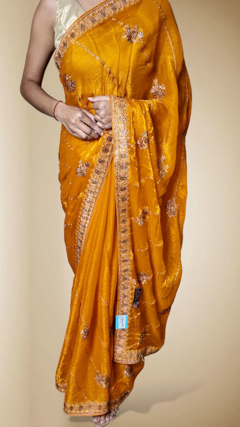 Saffron Radiant Regal Elegance Saree