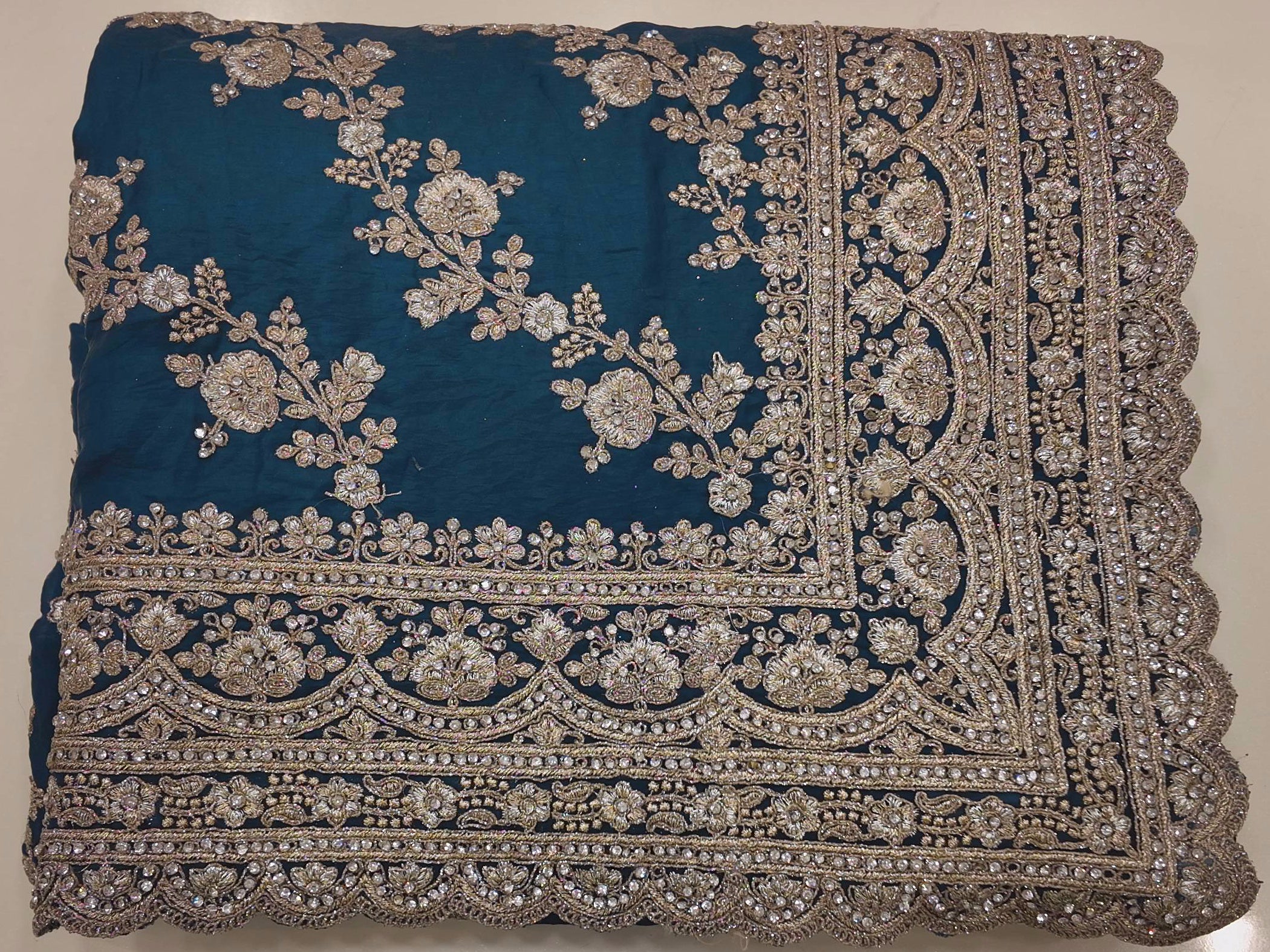 Regal Teal Saree with Intricate Silver Embroidery",