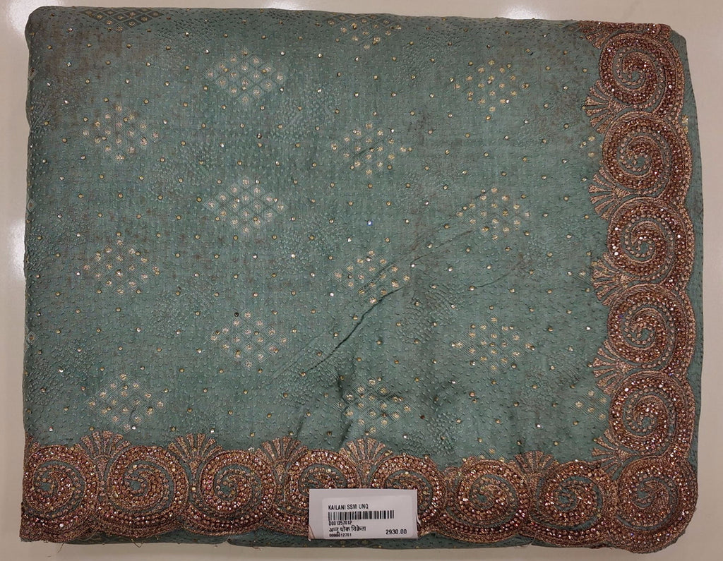 Glimmering Swirl Mint Saree with Intricate Border Details",