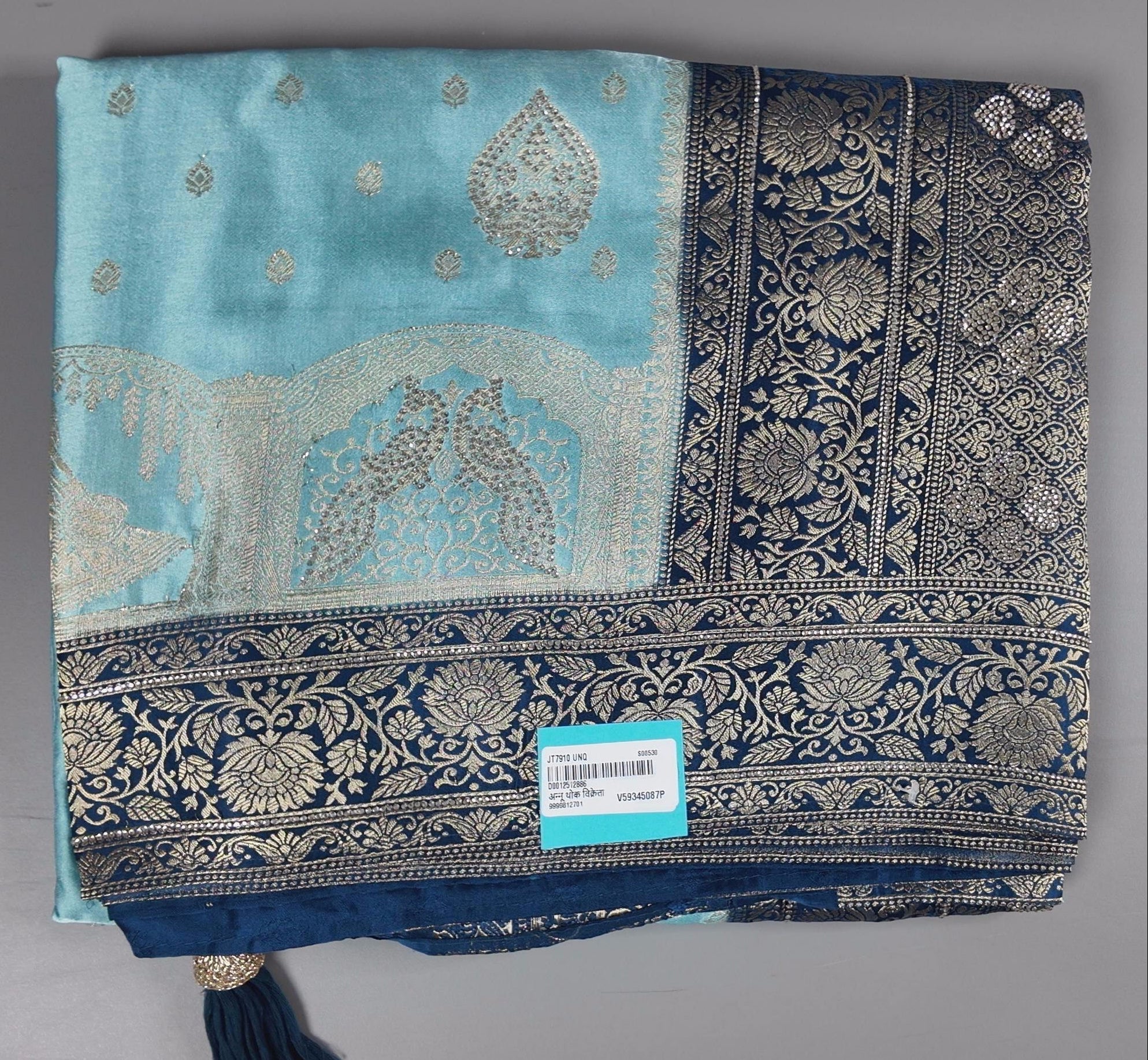 Ethereal Aqua Blue Brocade Saree with Intricate Silver Motifs",
