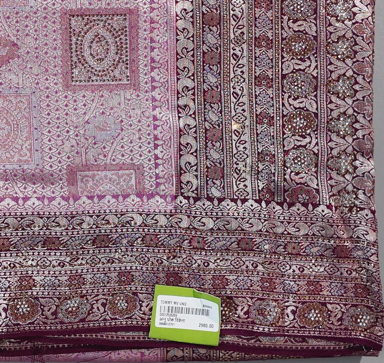 Radiant Maroon Tapestry Saree with Intricate Patterns",