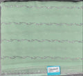 Mint Green Charm: Georgette Saree with Sequined Waves",