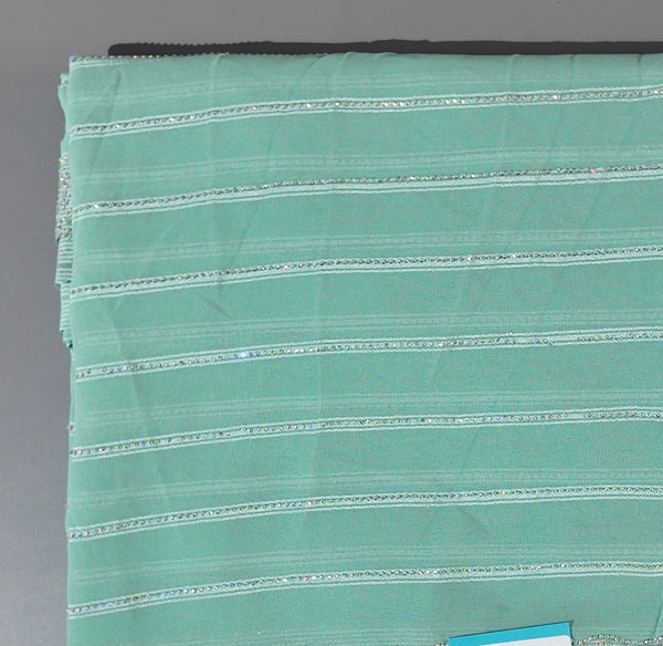 Aqua Luster: Luxe Striped Shimmer Saree",