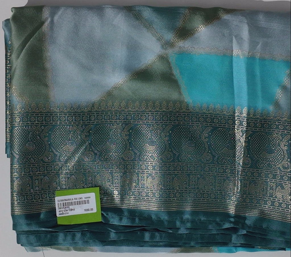Seafoam Dreams: Luxurious Silk Saree with Intricate Motifs",