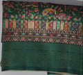 Vibrant Forest Green Saree with Festive Motifs",