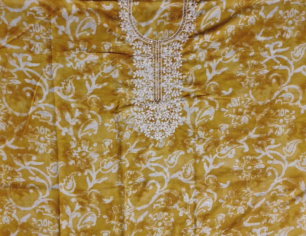 Sunlit Ornaments: Elegant Amber Unstitched Suit Set