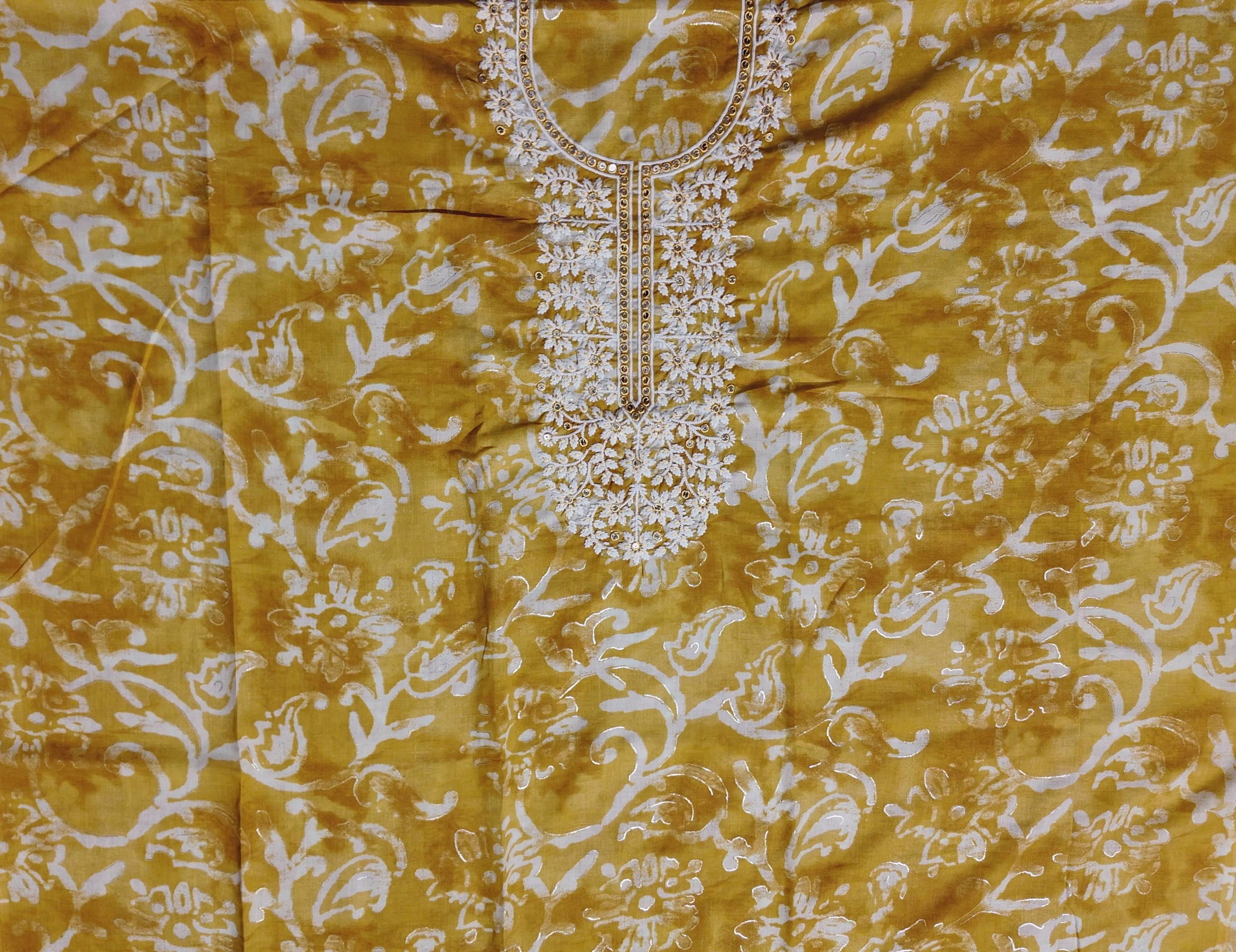 Sunlit Ornaments: Elegant Amber Unstitched Suit Set