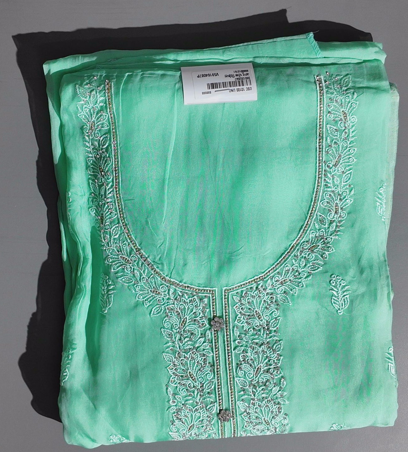 Exquisite Mint Green Unstitched Suit for Festive Elegance",