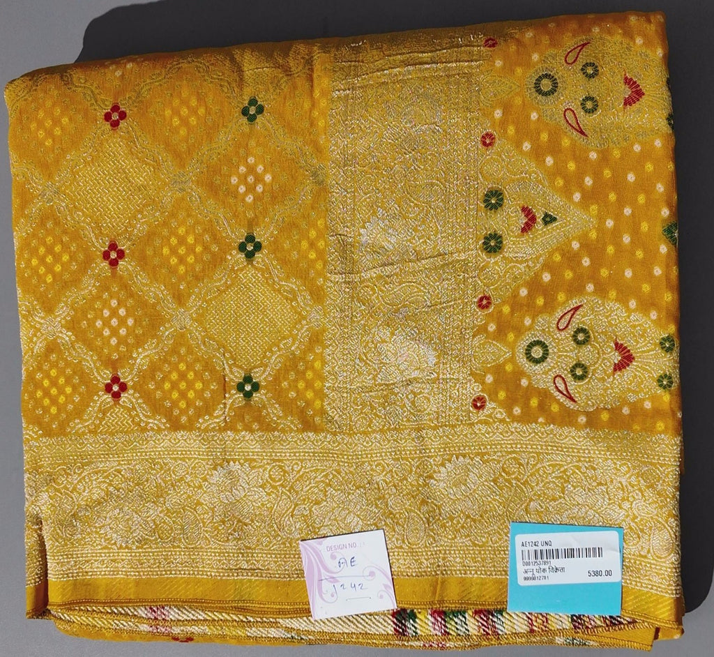Radiant Mustard Unstitched Suit with Intricate Motifs",