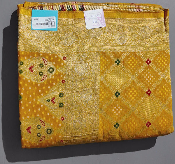 Radiant Mustard Unstitched Suit with Intricate Motifs",