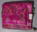 Vibrant Fuchsia Floral Tapestry Unstitched Suit - Festive Charm",