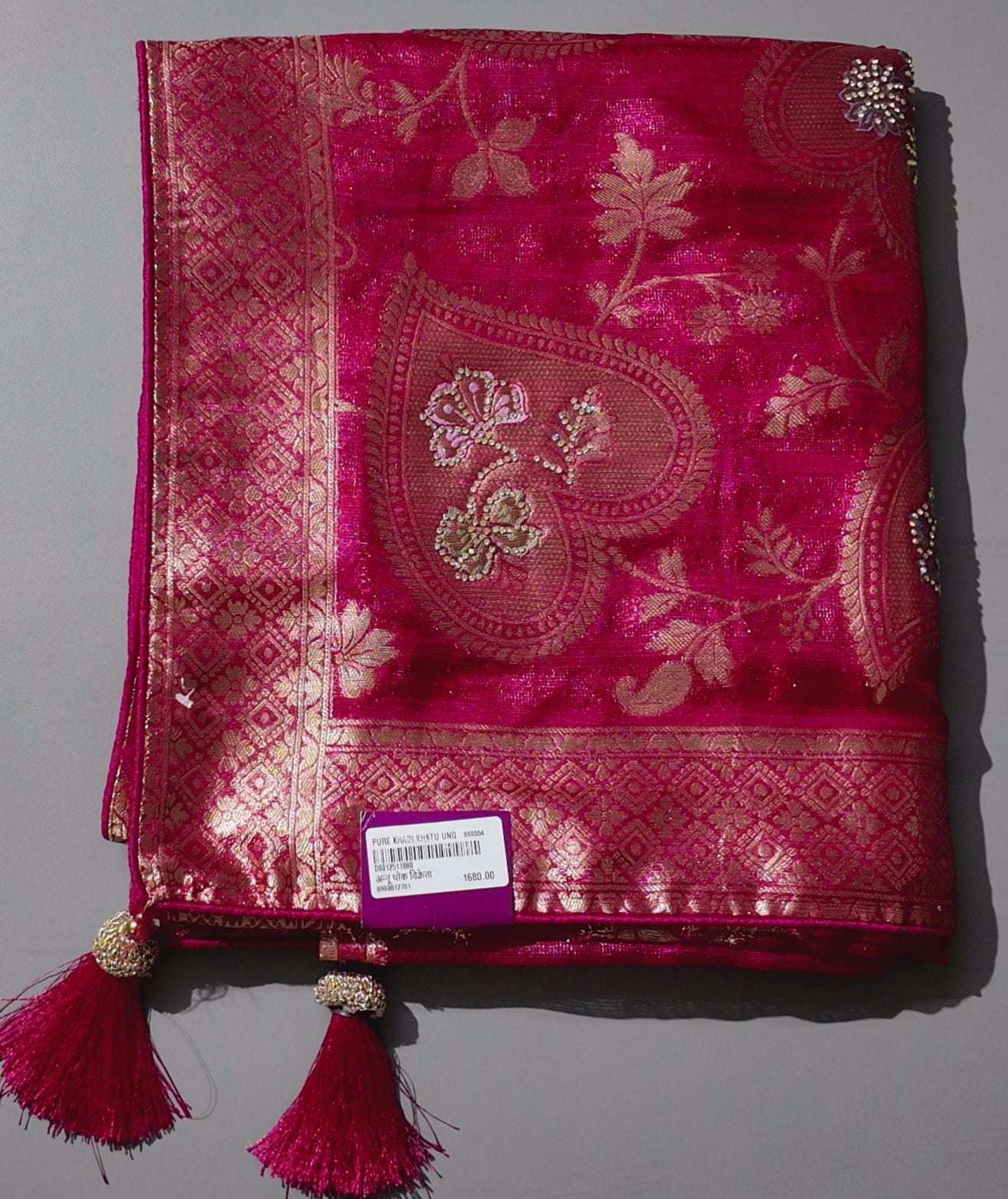 Blossom Aura: Radiant Red Silk Saree with Intricate Floral Motifs",