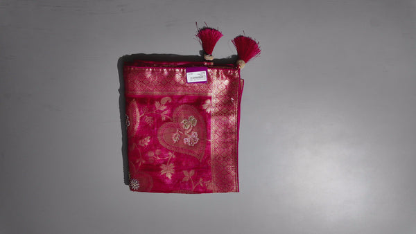 Blossom Aura: Radiant Red Silk Saree with Intricate Floral Motifs",