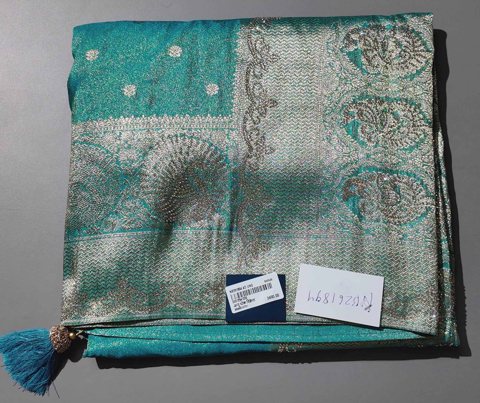 Luxe Teal Heritage Saree with Intricate Silver Weave",