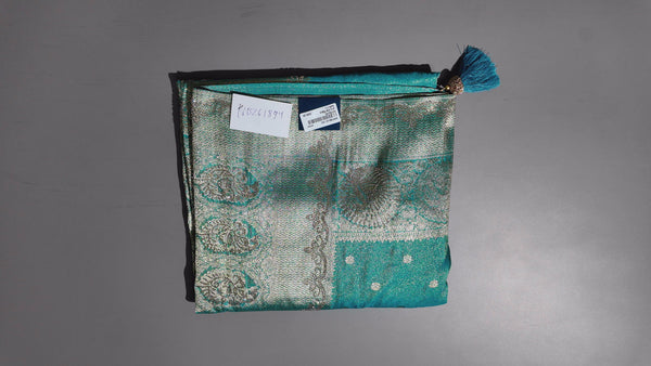 Luxe Teal Heritage Saree with Intricate Silver Weave",
