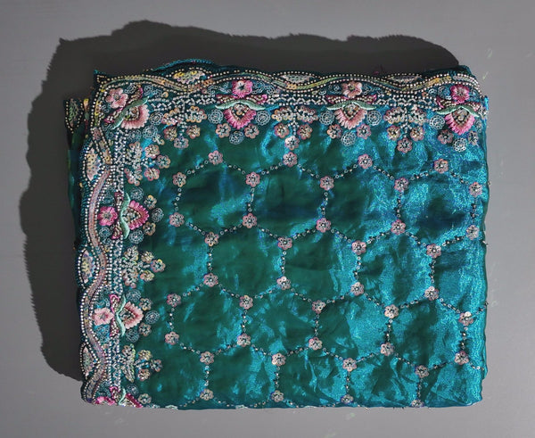 Radiant Teal Dream: Embroidered Floral Extravaganza Saree",