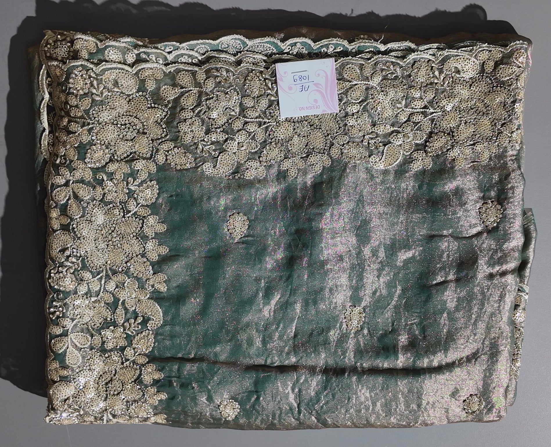 Opulent Green Saree with Exquisite Gold Embroidery",