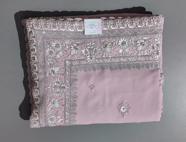 Blossom Whisper: Enchanting Pink Embroidered Saree",