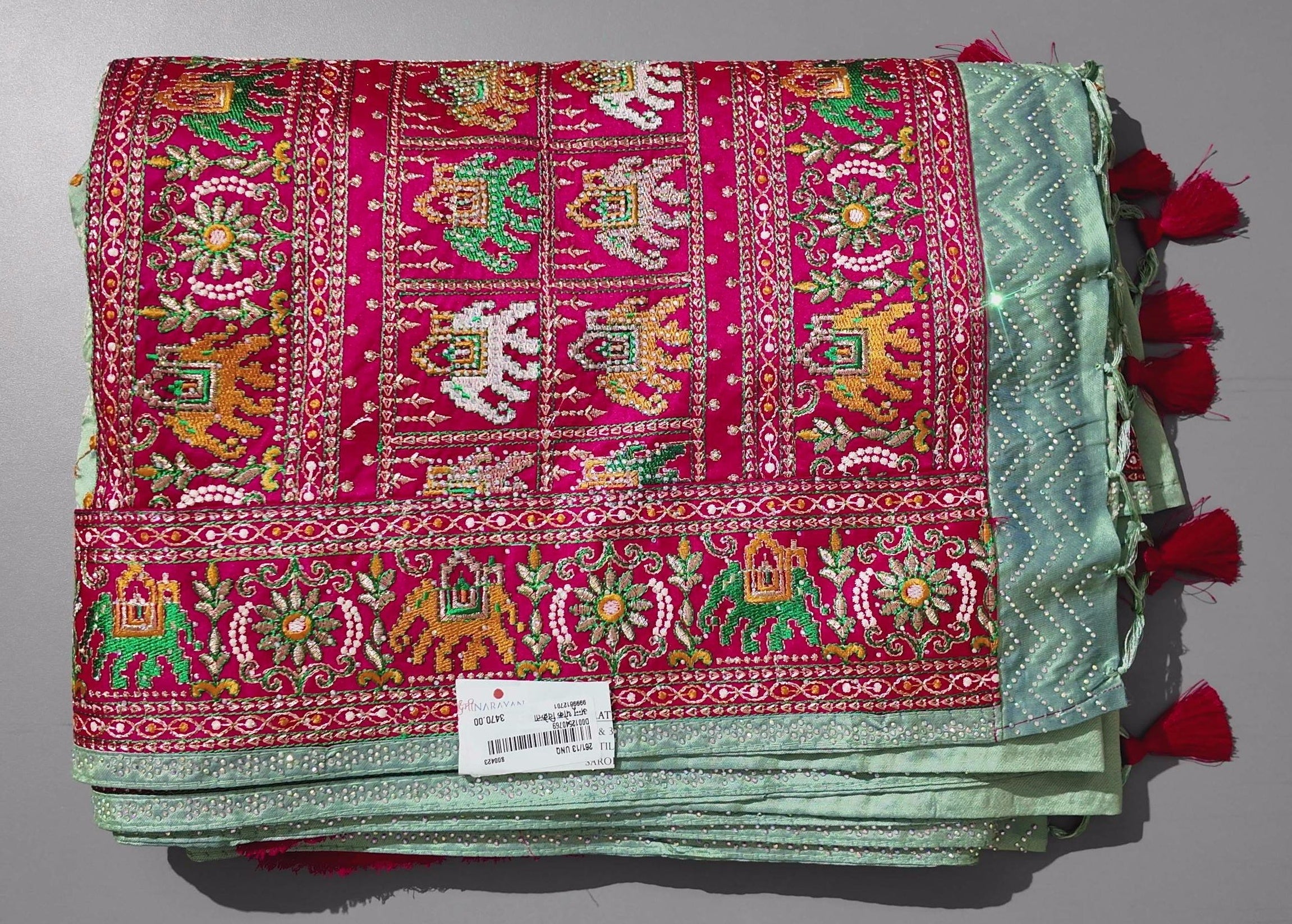 Festive Radiance: Vibrant Embroidered Silk Saree",