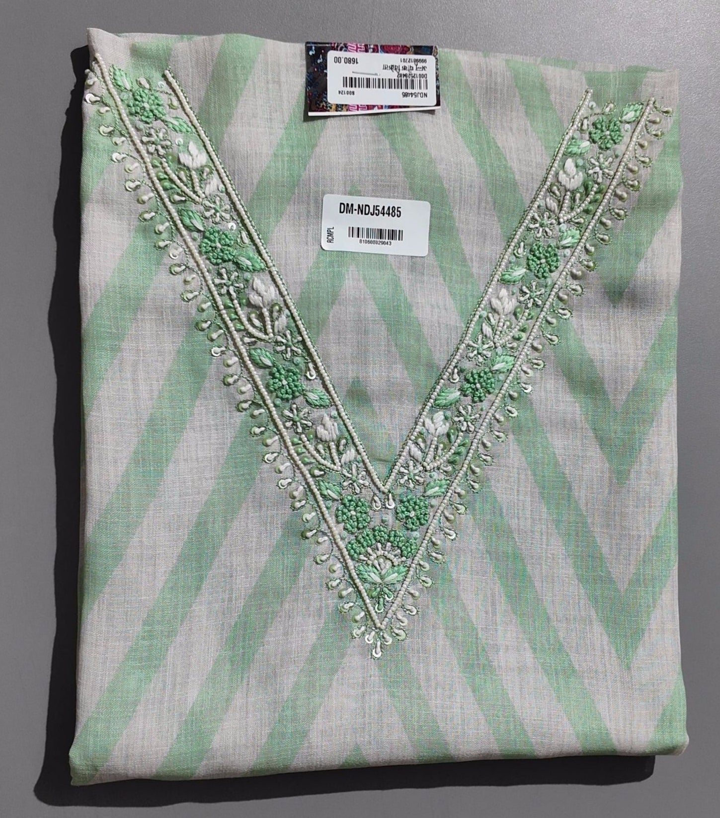 Timeless Charm: Mint Green Unstitched Suit with Embroidered Elegance