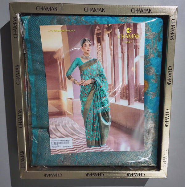 Vibrant Teal Enchantment: Traditional Saree for Festive Occasions",