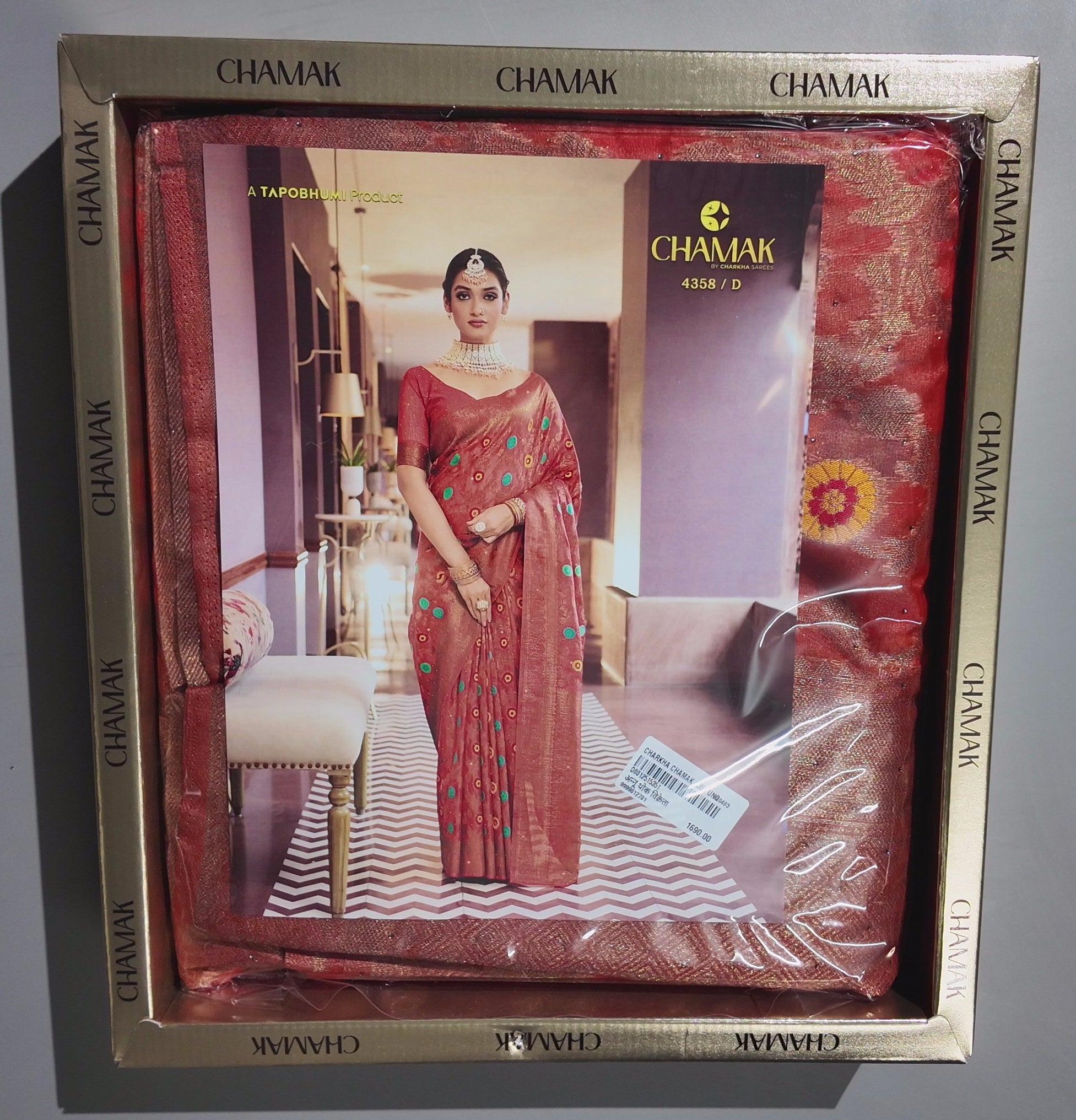 Vibrant Maroon Tapestry Saree with Intricate Floral Detailing",