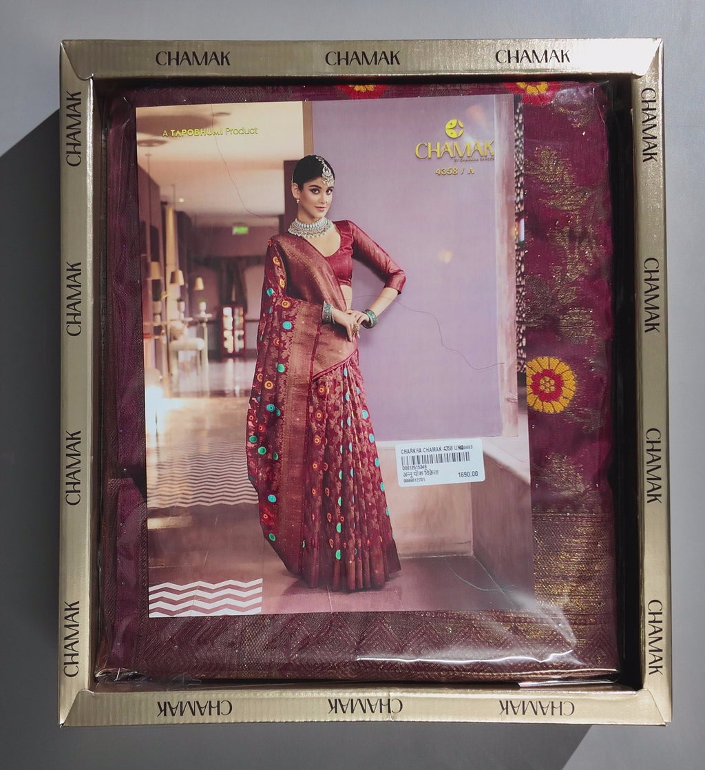 Opulent Maroon Silk Saree with Intricate Floral Motifs",