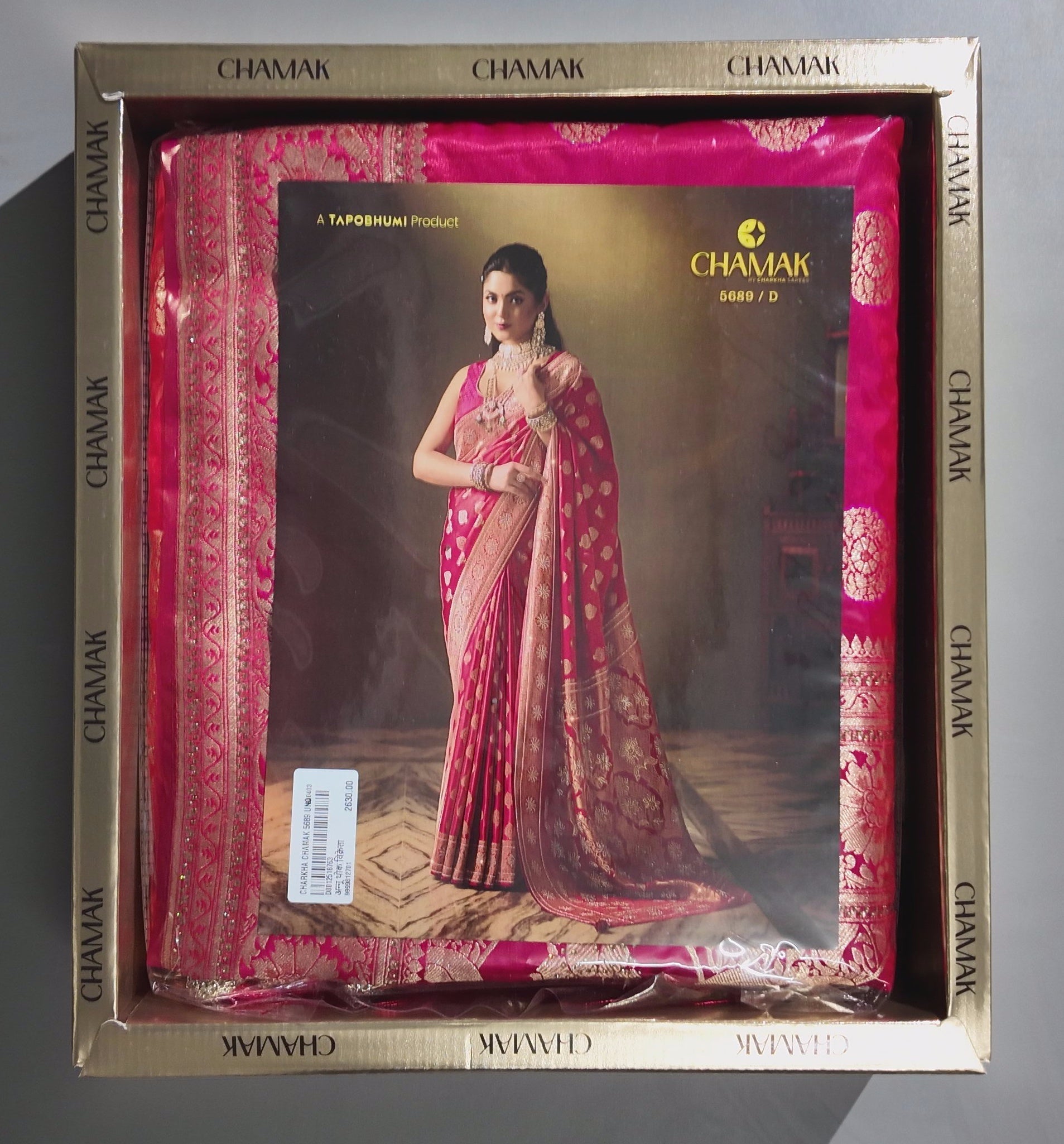 Opulent Pink Silk Saree with Intricate Zari Embroidery",