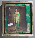 Emerald Enchantment: Traditional Green Saree with Opulent Gold Detailing",
