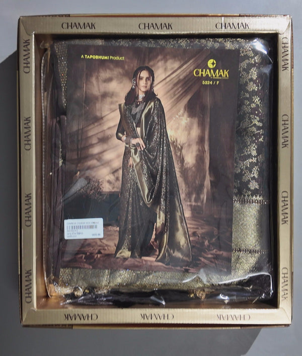 Shimmering Night: Luxe Designer Saree with Golden Hues",