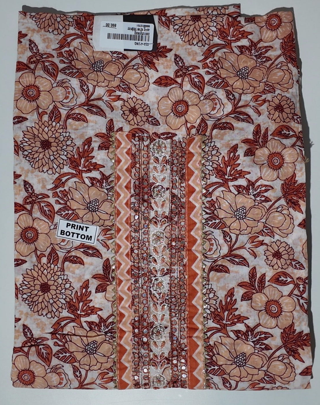 Floral Symphony: Unstitched Suit with Playful Patterns