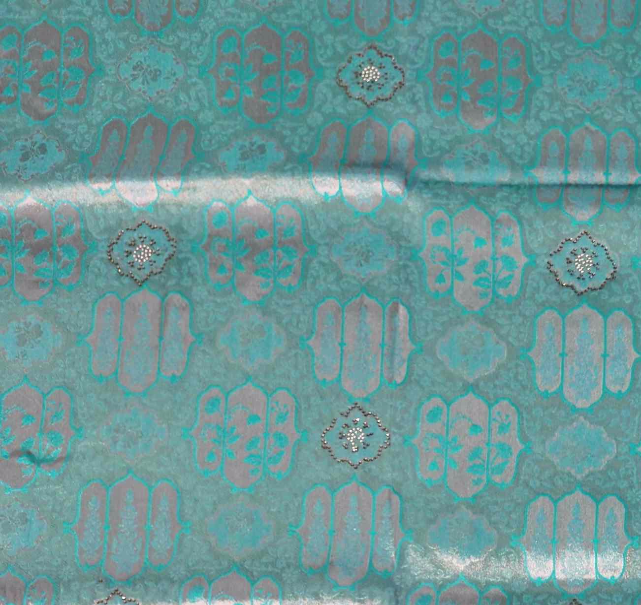 Icy Teal Ethnic Charm: Intricate Patterned Saree",