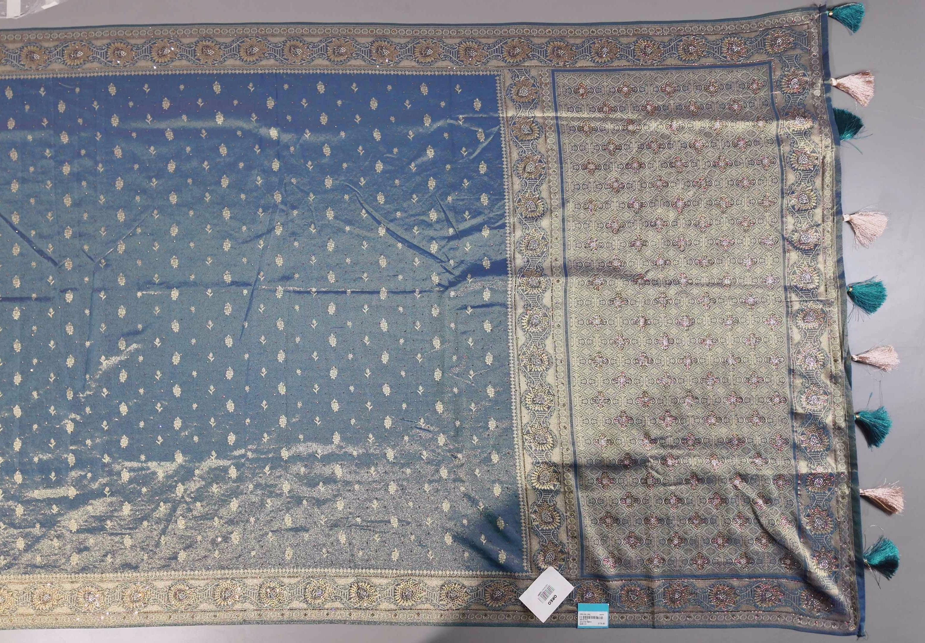 Enchanting Teal Banarasi Saree with Intricate Zari Details",