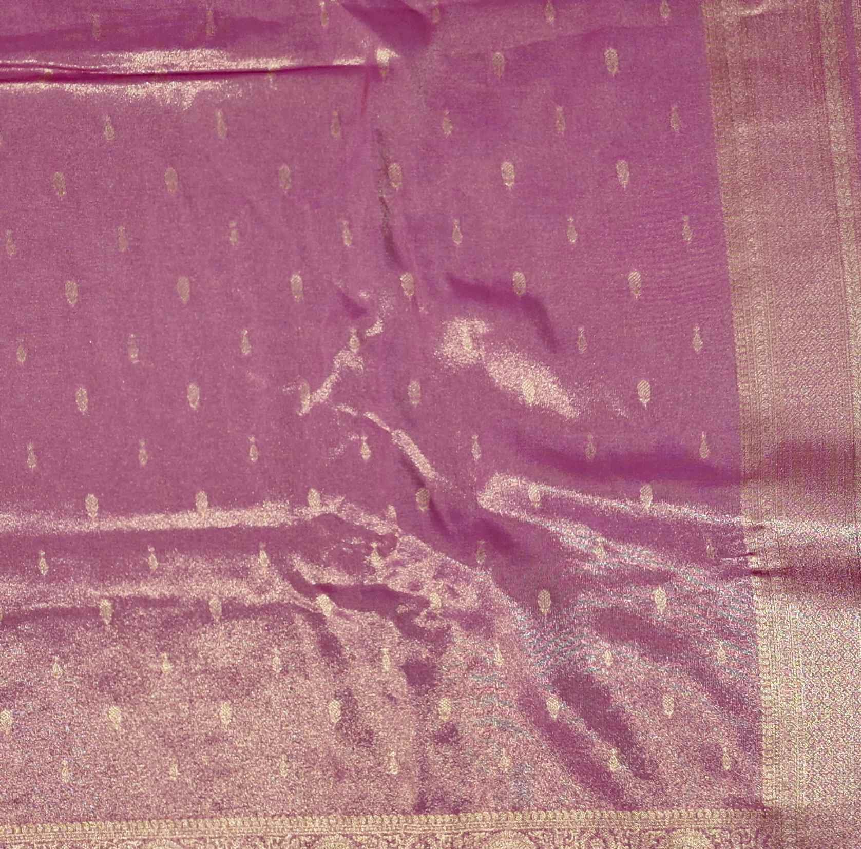 Majestic Pink Banarasi Silk Saree with Ornate Gold Woven Patterns",