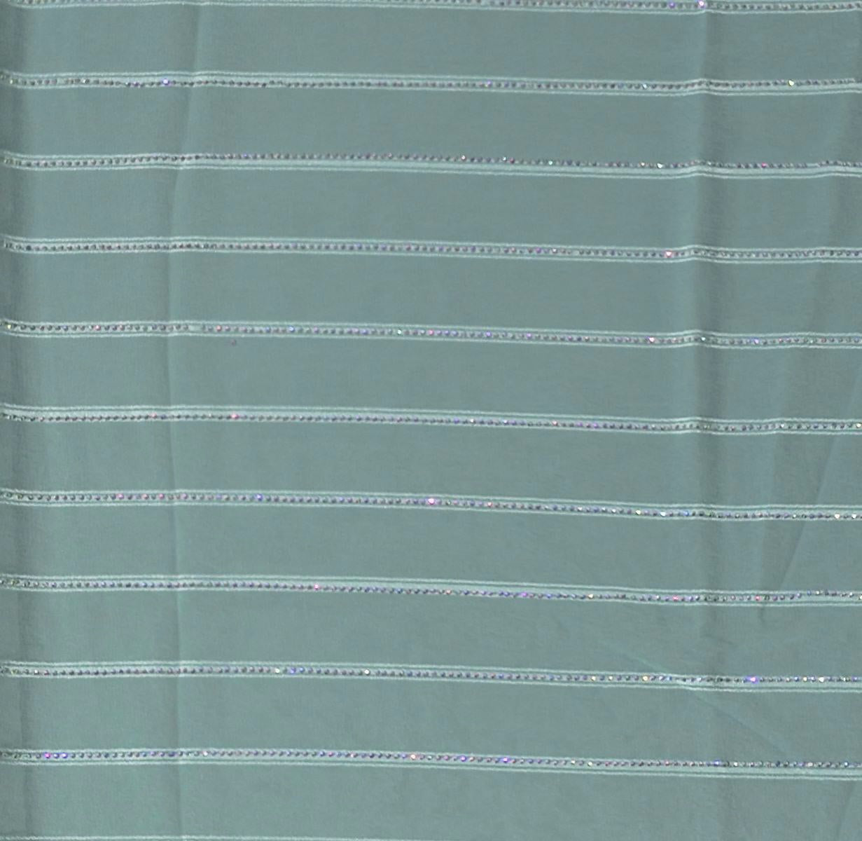 Aqua Luster: Luxe Striped Shimmer Saree",
