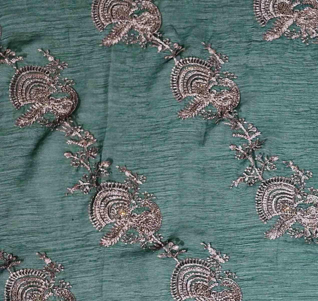 Luxurious Green Embroidered Saree with Peacock Motifs",