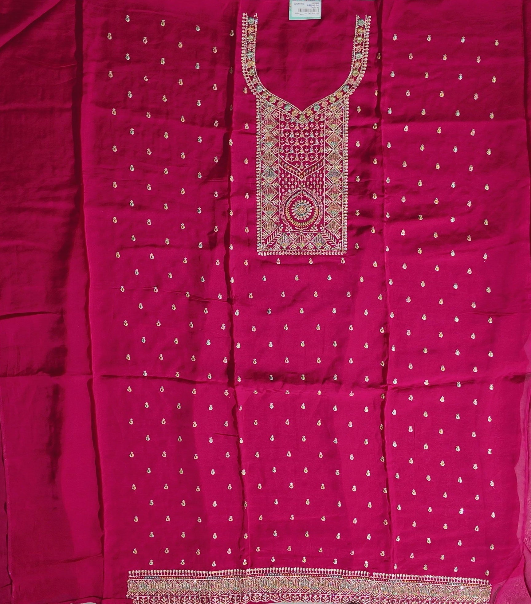 Festive Fuchsia Glam: Intricate Embroidered Unstitched Suit",