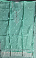 Exquisite Mint Green Unstitched Suit for Festive Elegance