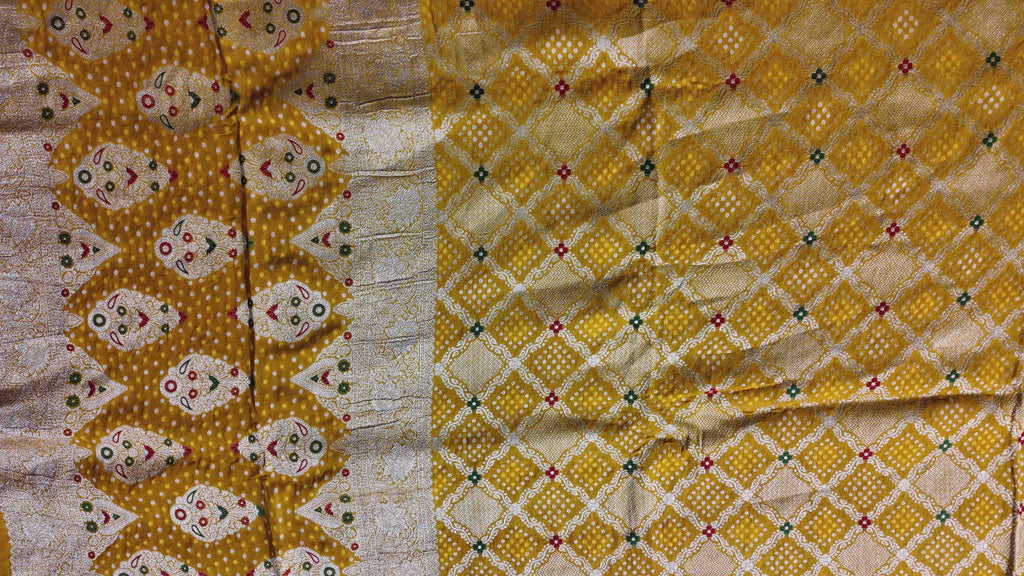 Radiant Mustard Unstitched Suit with Intricate Motifs",