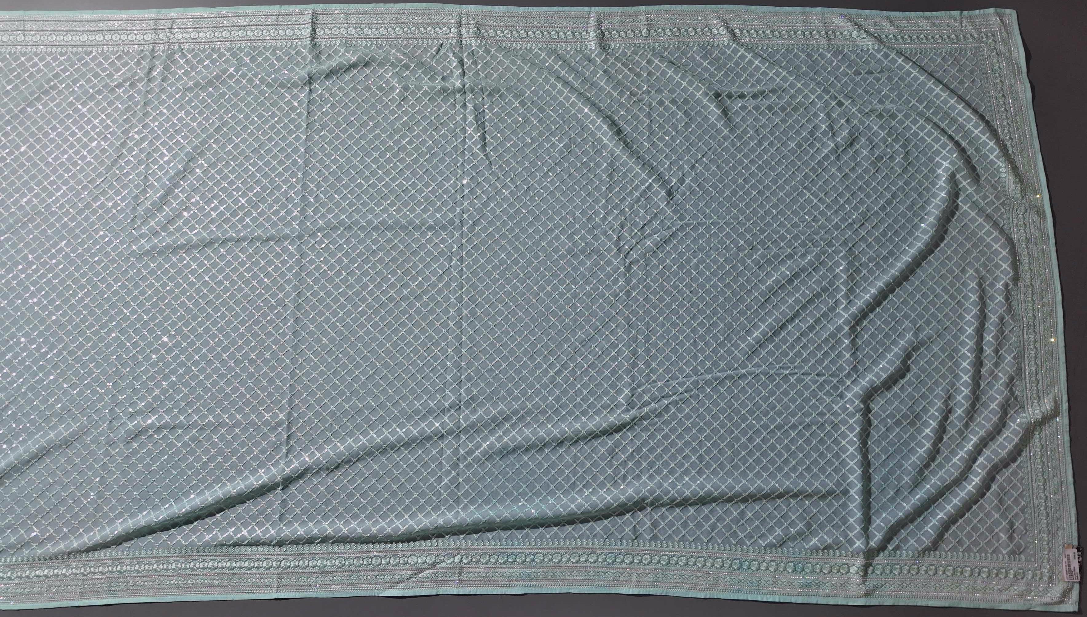 Mint Grace: Artfully Crafted Unstitched Suit Fabric",