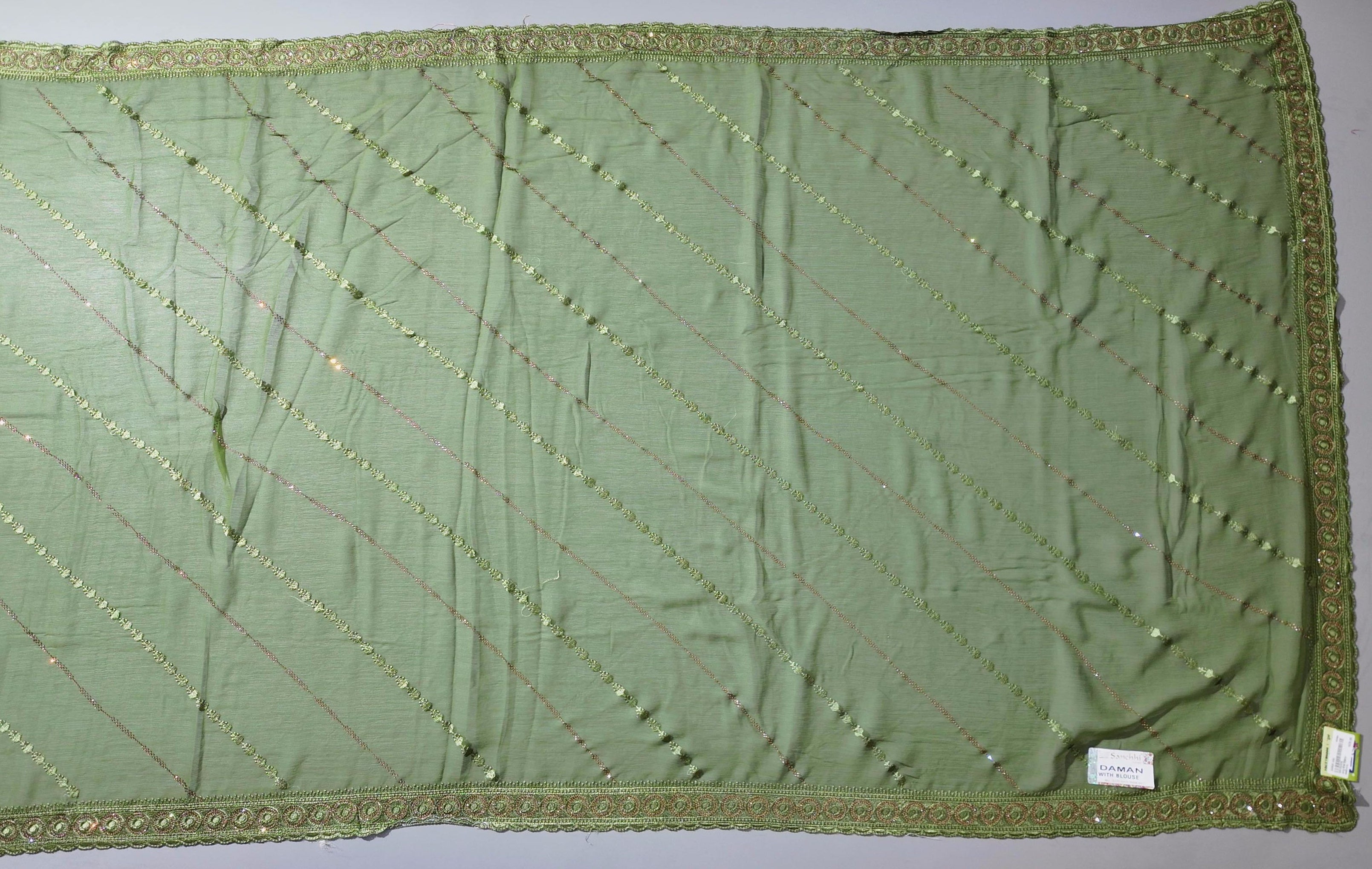 Lush Green Artistry: Handcrafted Unstitched Ensemble",