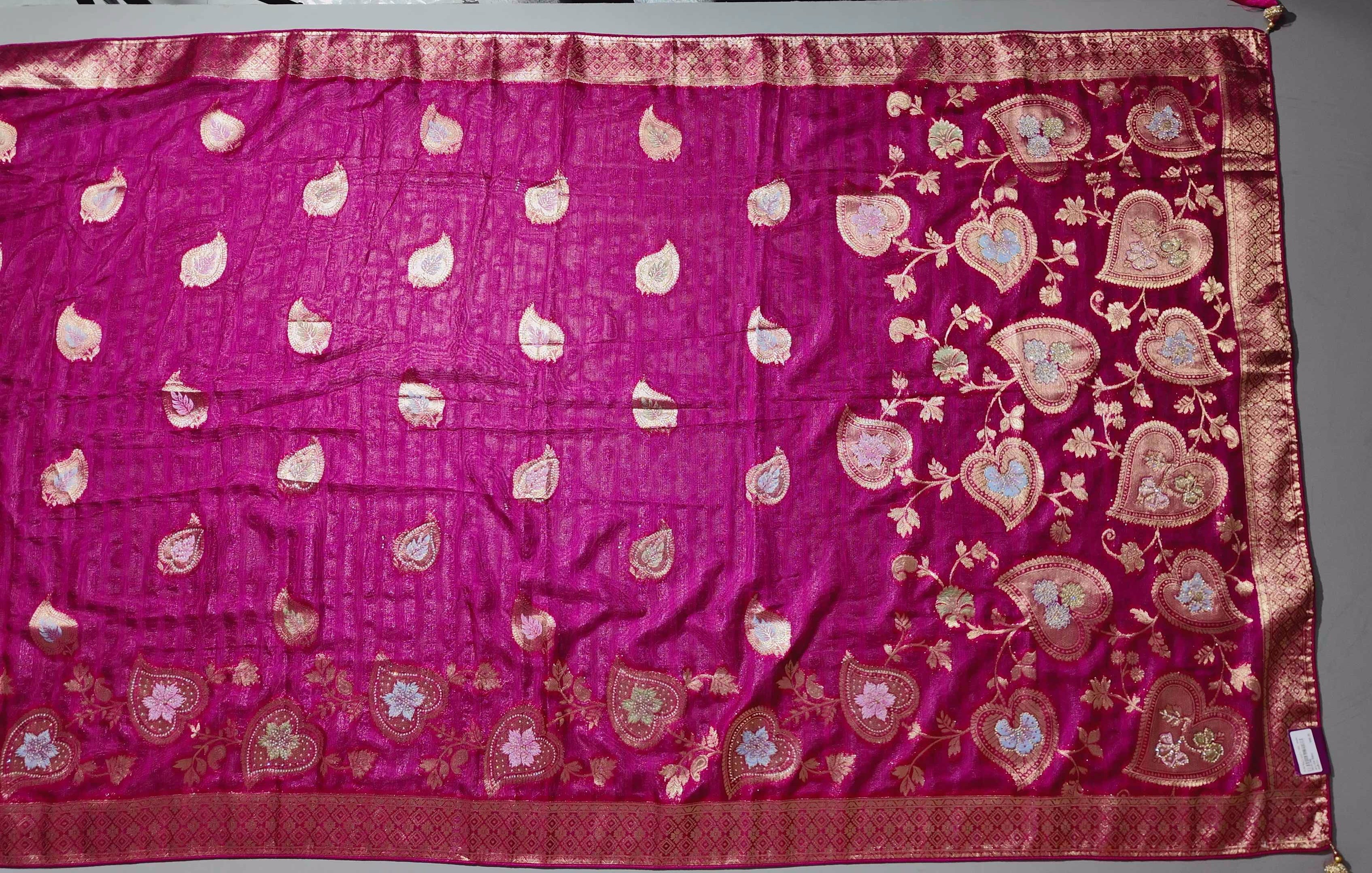 Opulent Ruby Red Saree with Intricate Golden Embroidery",