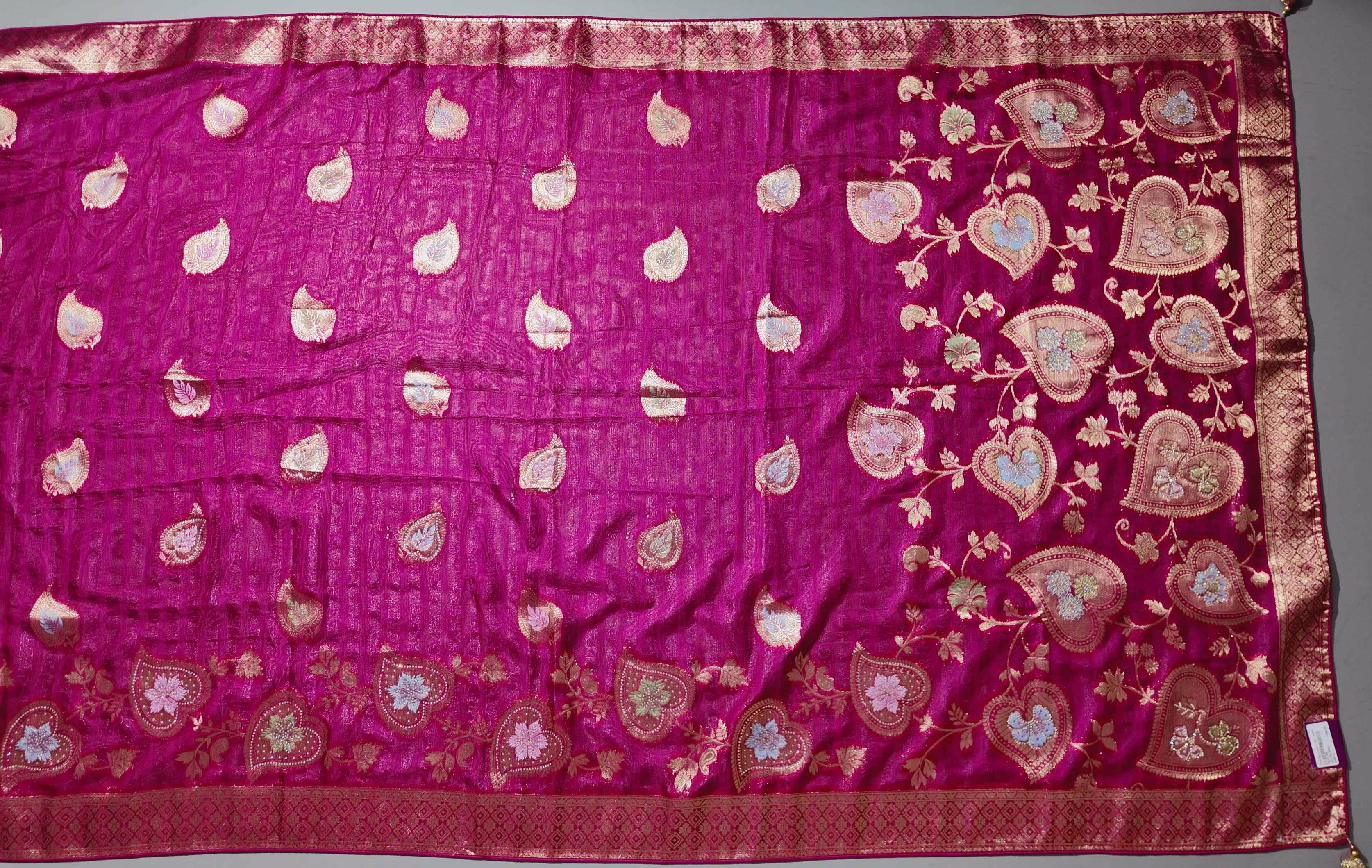 Blossom Aura: Radiant Red Silk Saree with Intricate Floral Motifs",