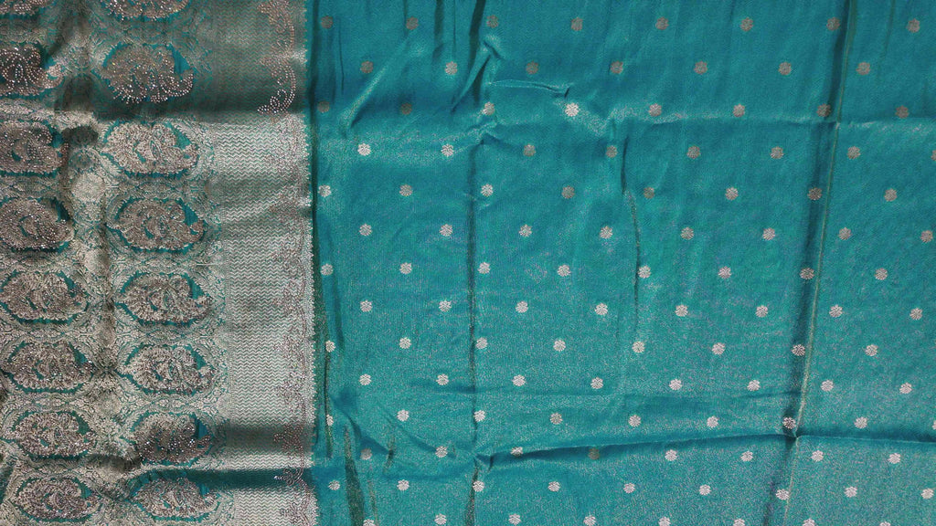 Luxe Teal Heritage Saree with Intricate Silver Weave",