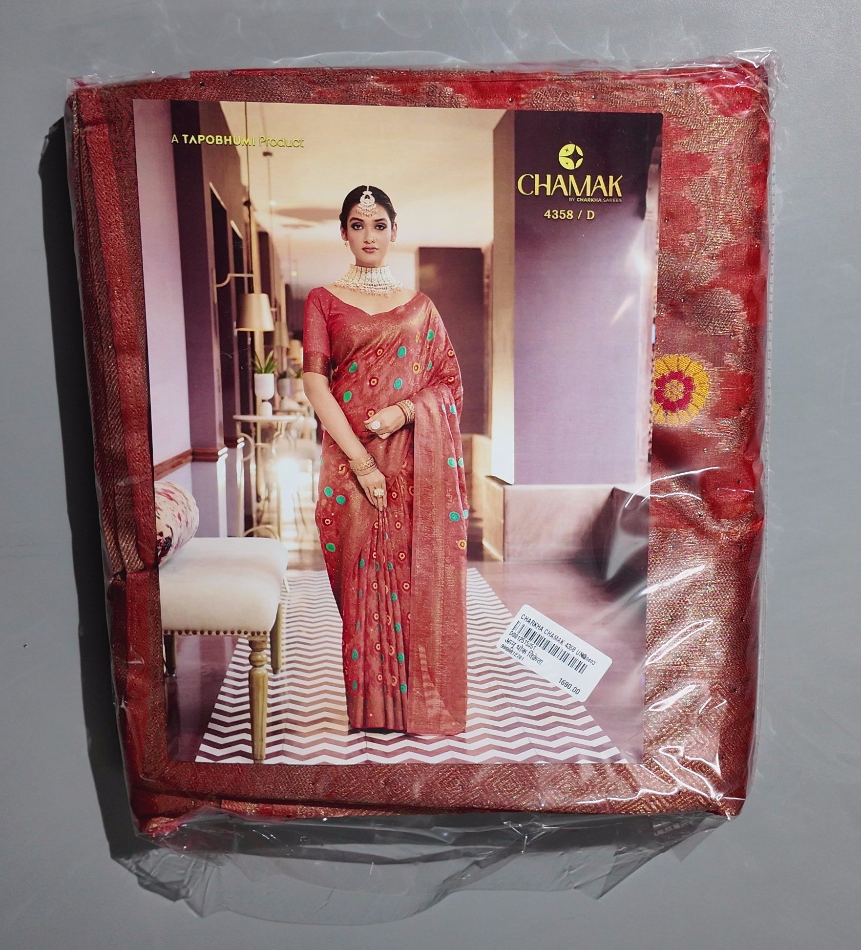 Vibrant Maroon Tapestry Saree with Intricate Floral Detailing",